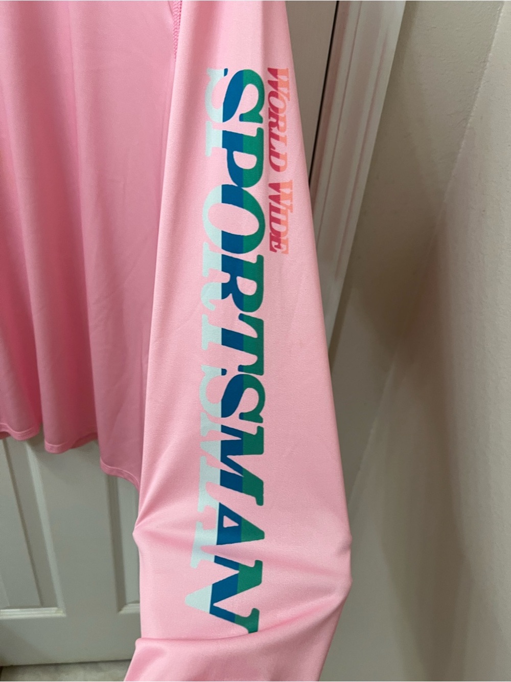 Bass Pro Shops Pink Long Sleeve Tee with Blue-Green 'SPORTSMAN' Sleeve Print